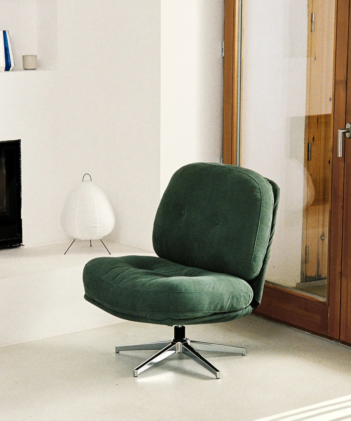 Fauteuil rotatif rembourré en velours côtelé Orbit