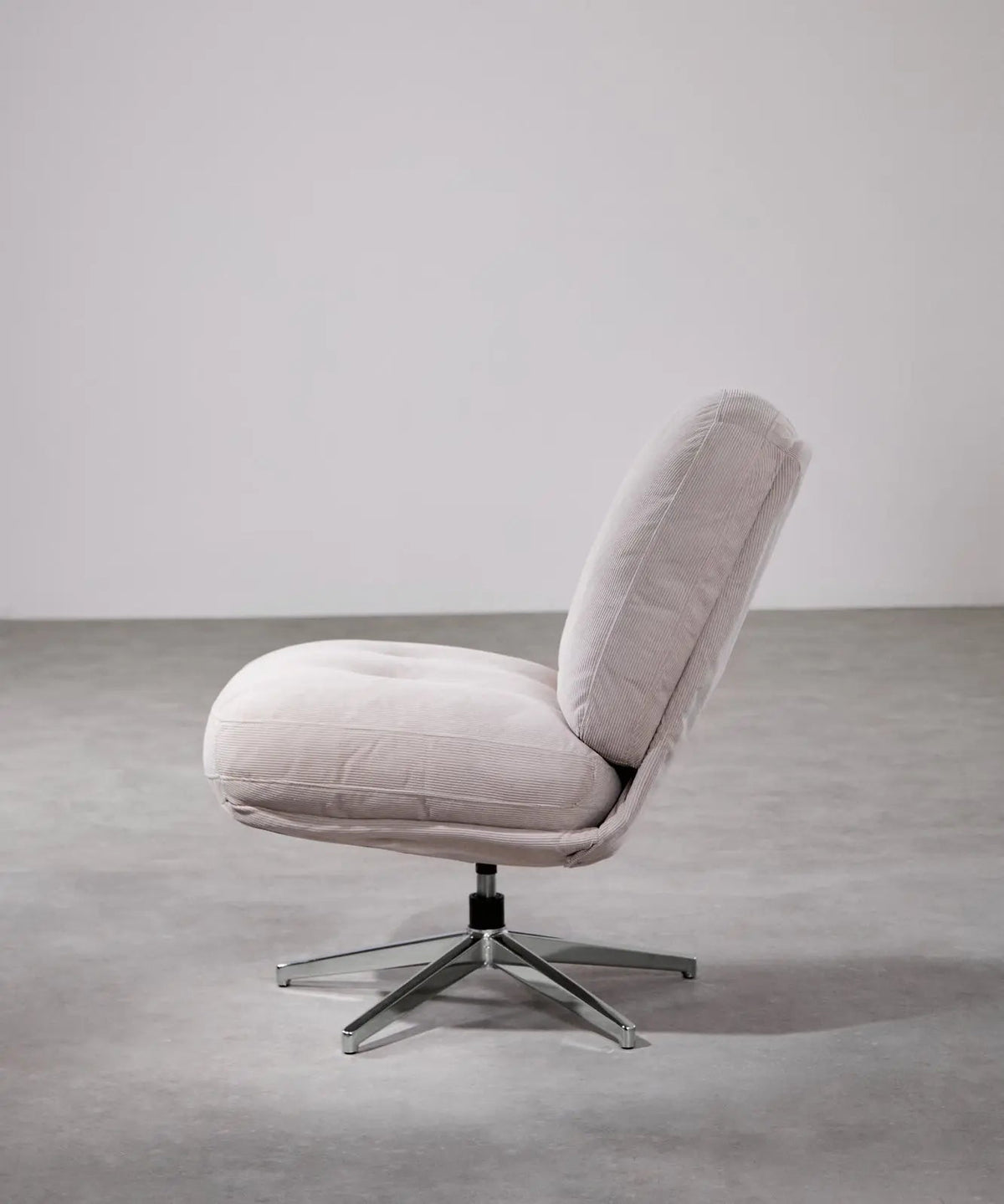 Fauteuil rotatif rembourré en velours côtelé Orbit