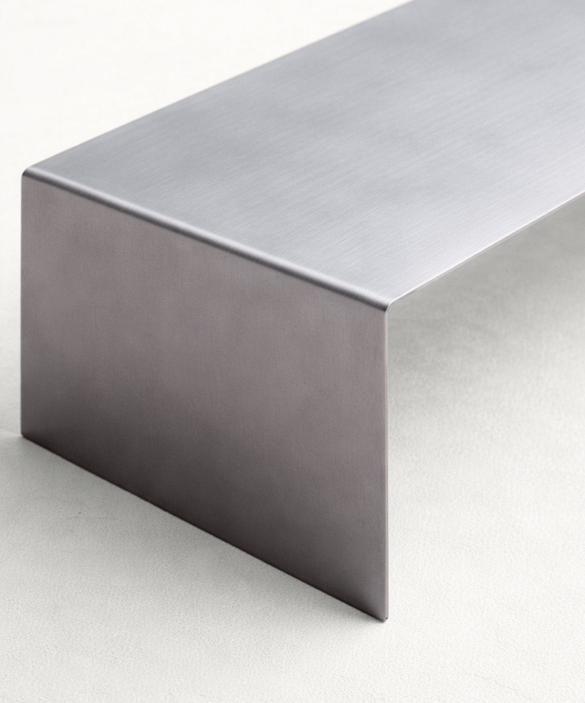 Table basse en métal trempé Claire (100x37 cm)