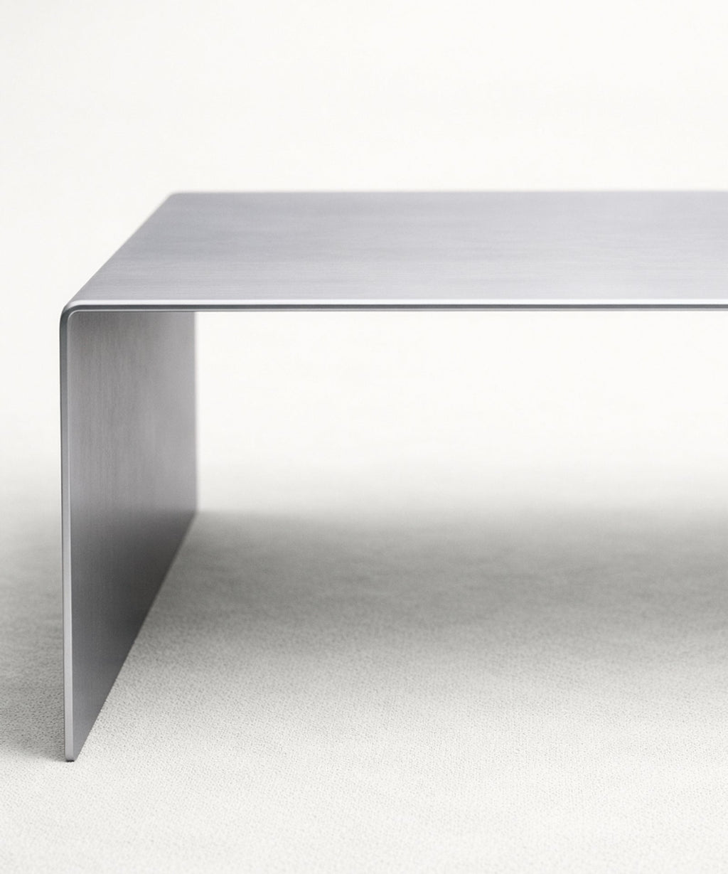 Table basse en métal trempé Claire (100x37 cm)