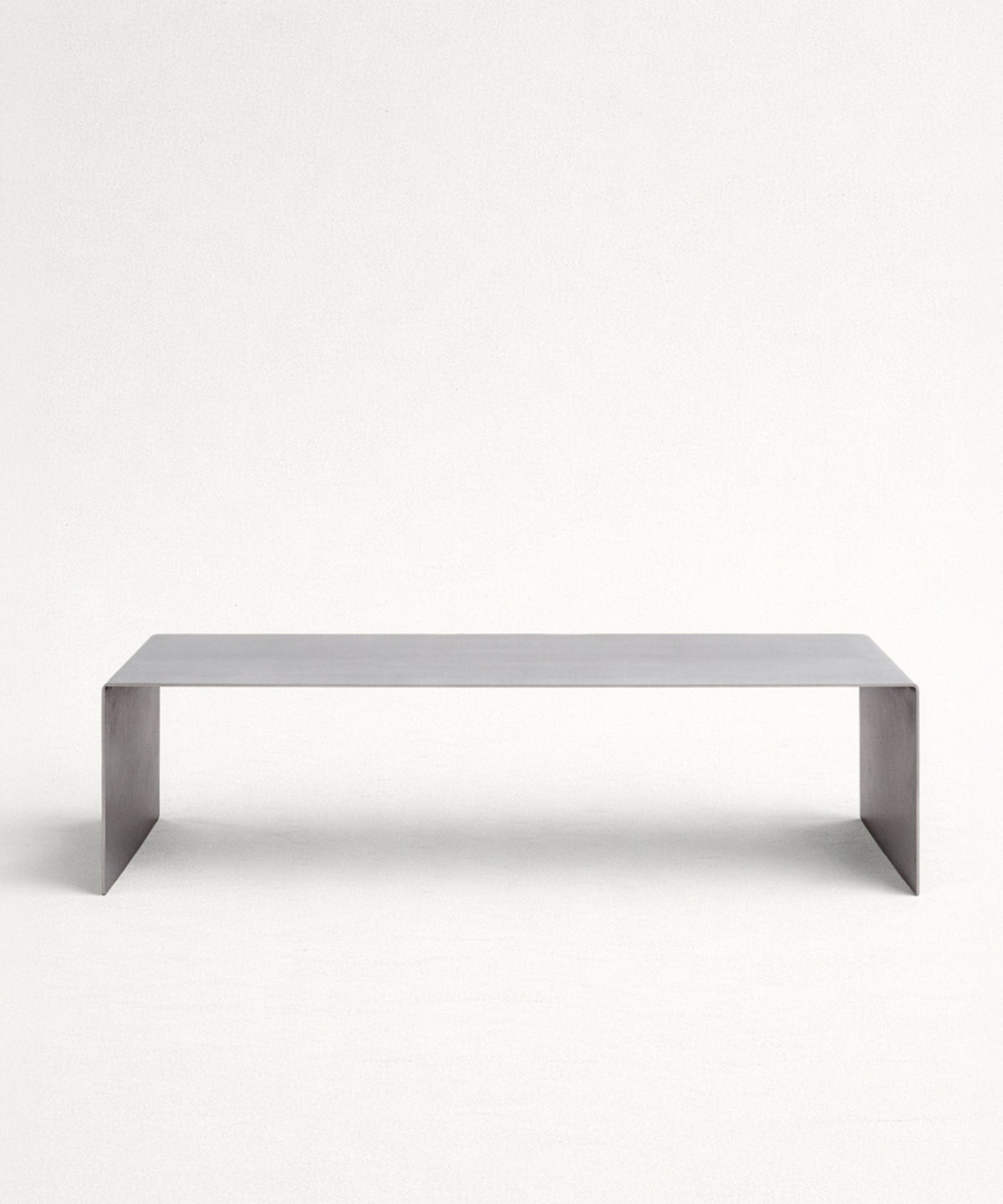 Table basse en métal trempé Claire (100x37 cm)