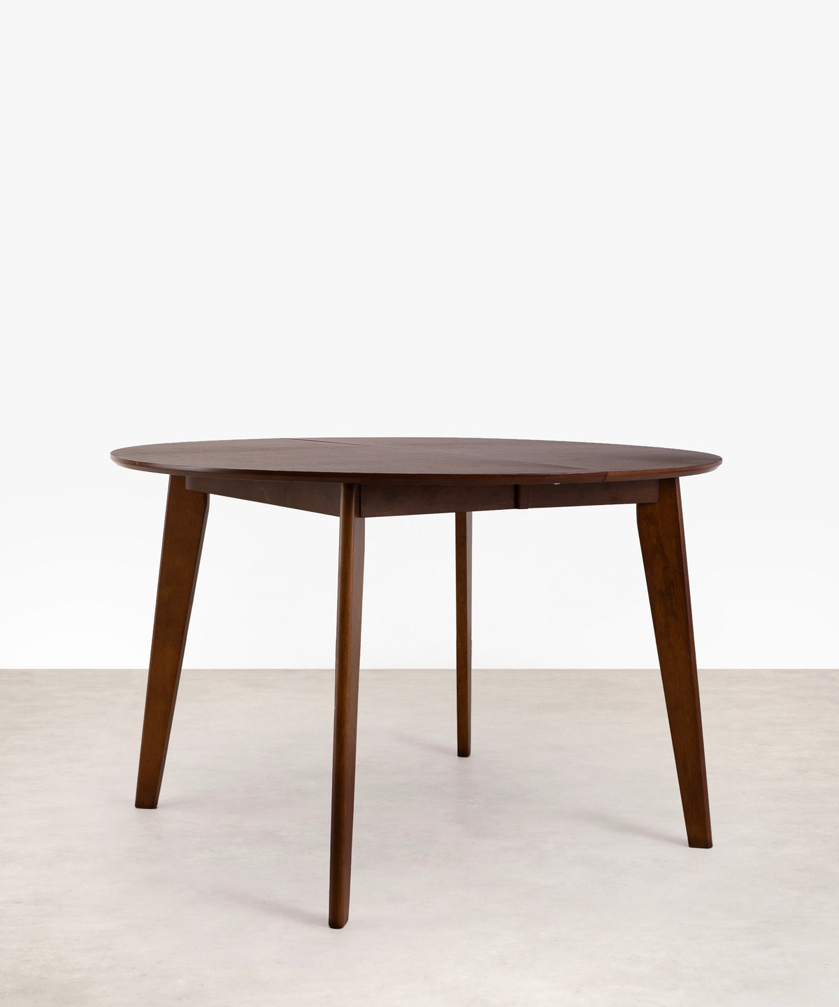 Table à manger ronde extensible en bois Gala Walnut (120–150 cm)