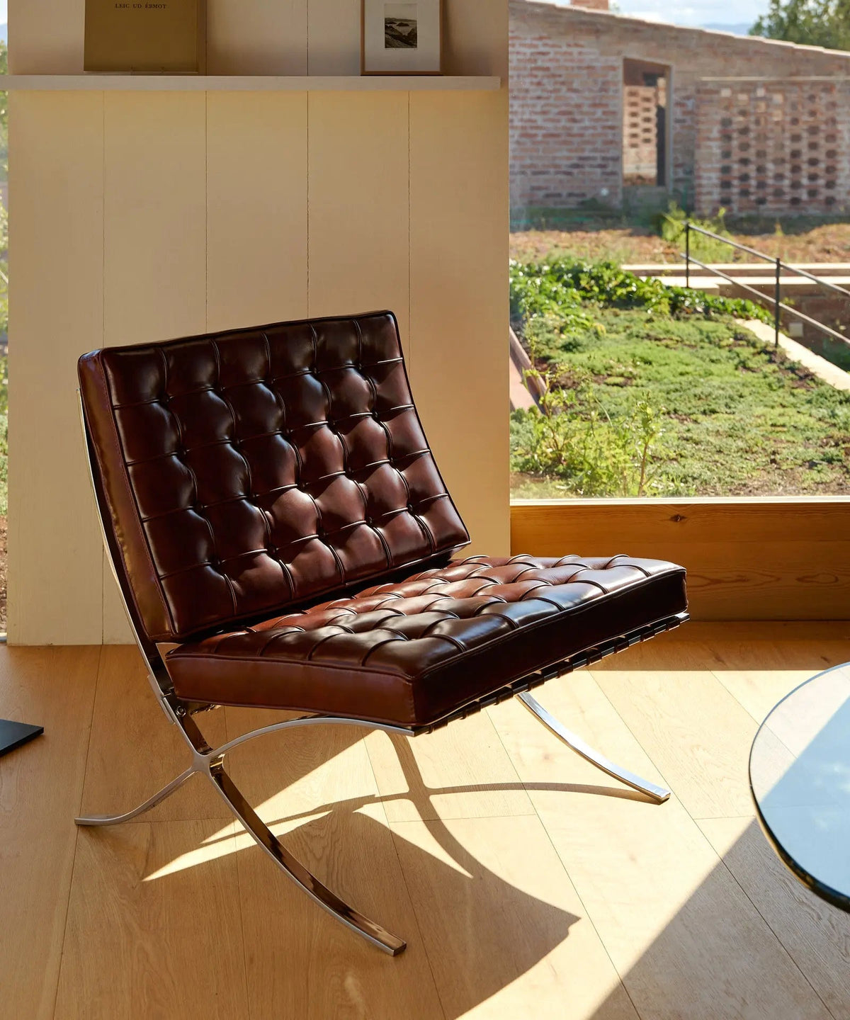 Chaise revêtue de cuir italien et acier Seline