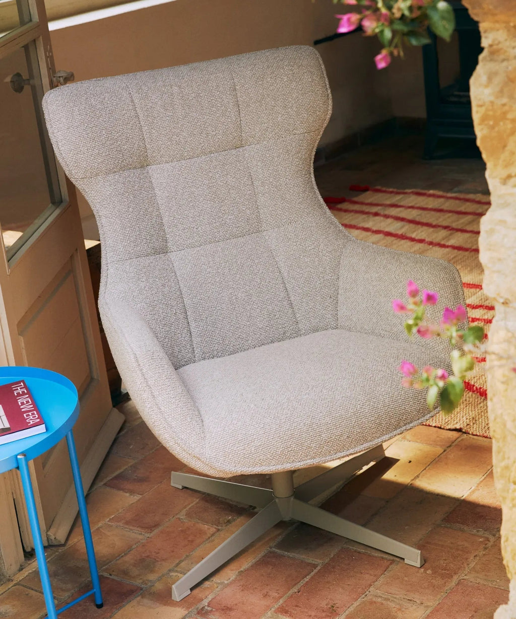Fauteuil rotatif de tissu bouclé Elsa
