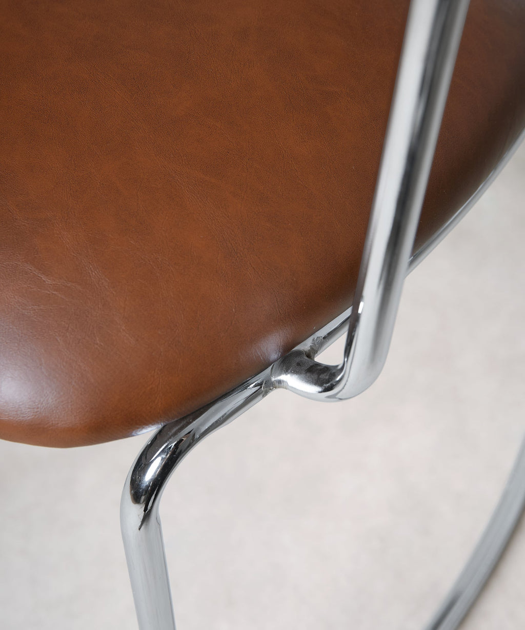 Chaise de salle à manger en similicuir et métal avec accoudoirs Moritz