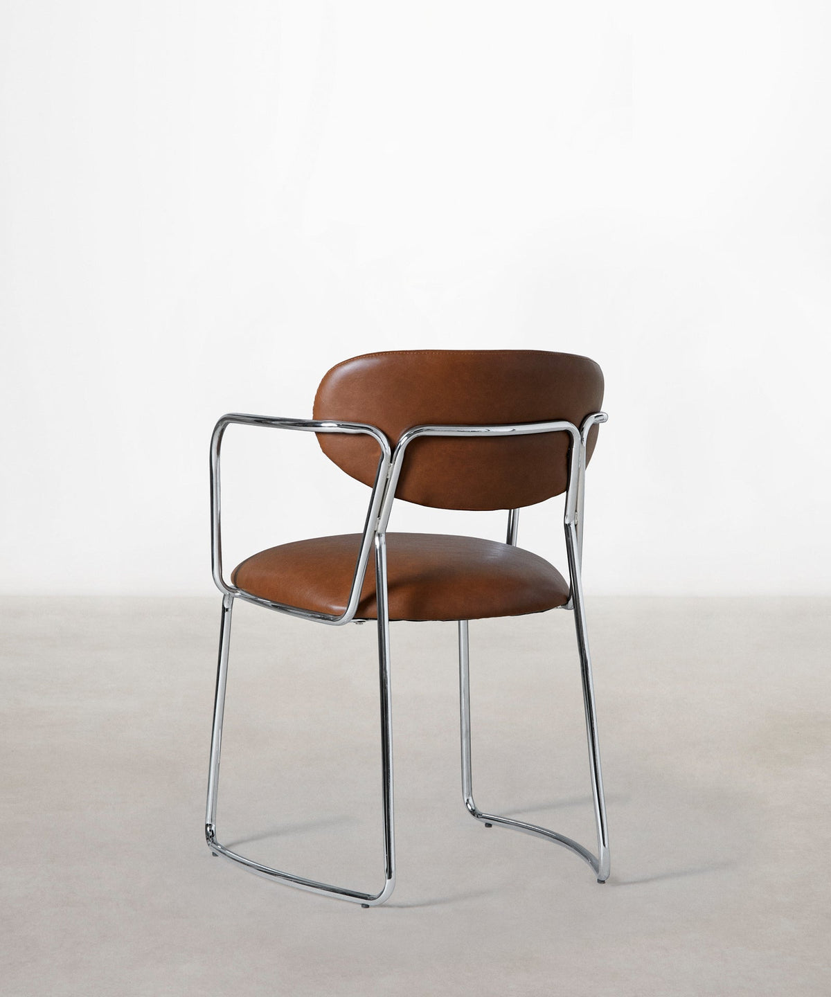 Chaise de salle à manger en similicuir et métal avec accoudoirs Moritz