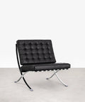 Chaise revêtue de cuir italien et acier Seline