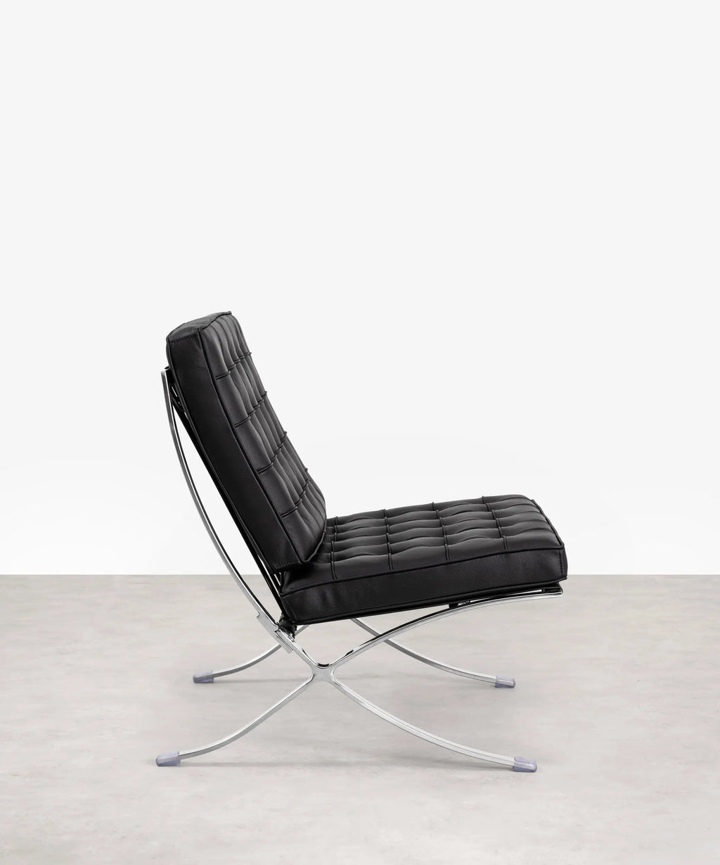 Chaise revêtue de cuir italien et acier Seline