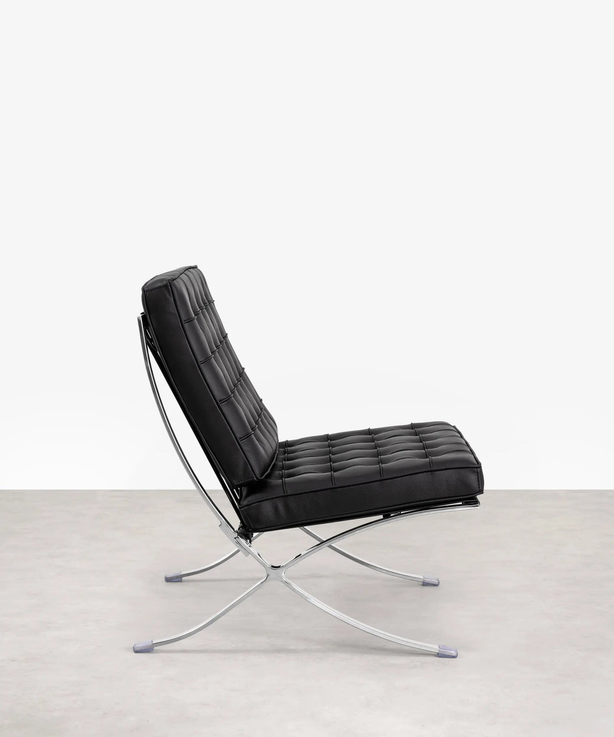 Chaise revêtue de cuir italien et acier Seline