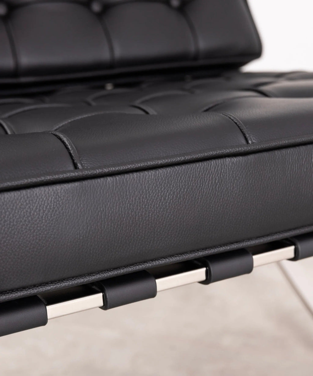 Chaise revêtue de cuir italien et acier Seline