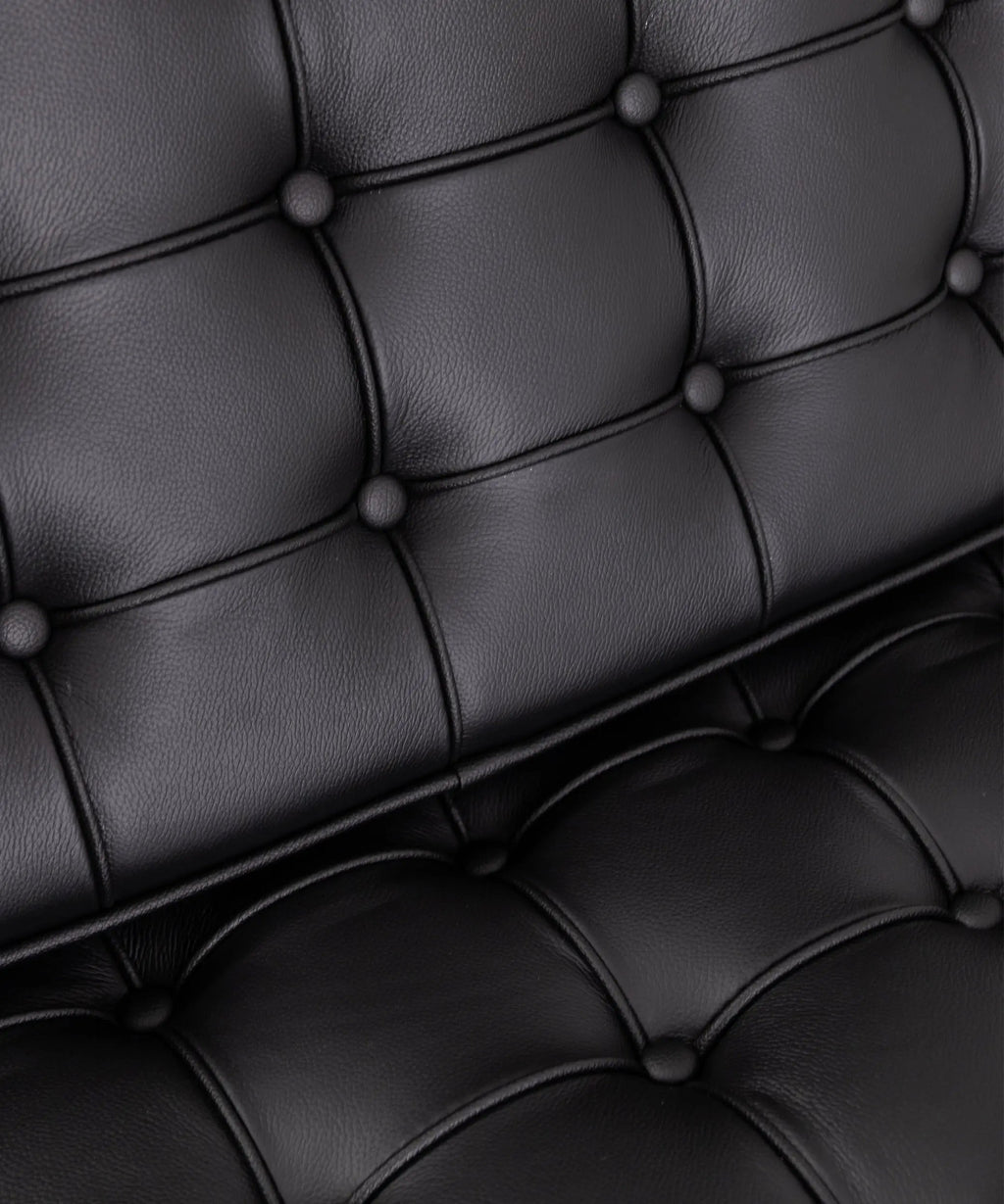 Chaise revêtue de cuir italien et acier Seline
