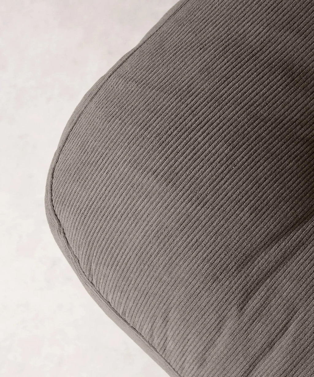 Fauteuil rotatif rembourré en velours côtelé Orbit
