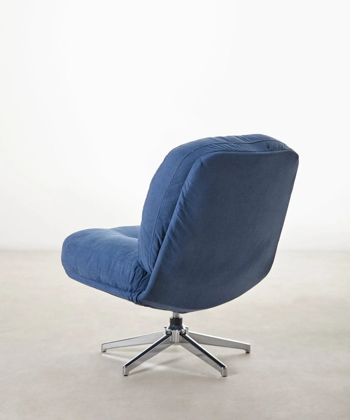 Fauteuil rotatif rembourré en velours côtelé Orbit