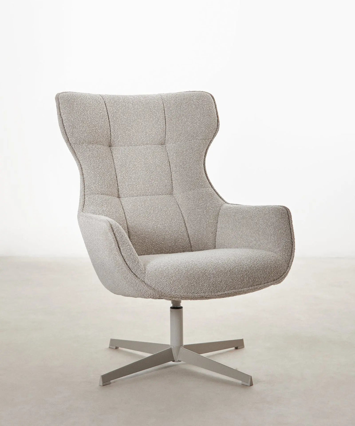 Fauteuil rotatif de tissu bouclé Elsa