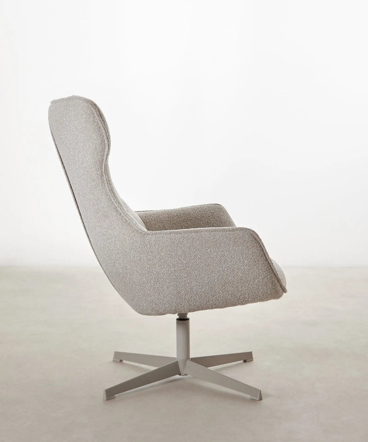 Fauteuil rotatif de tissu bouclé Elsa