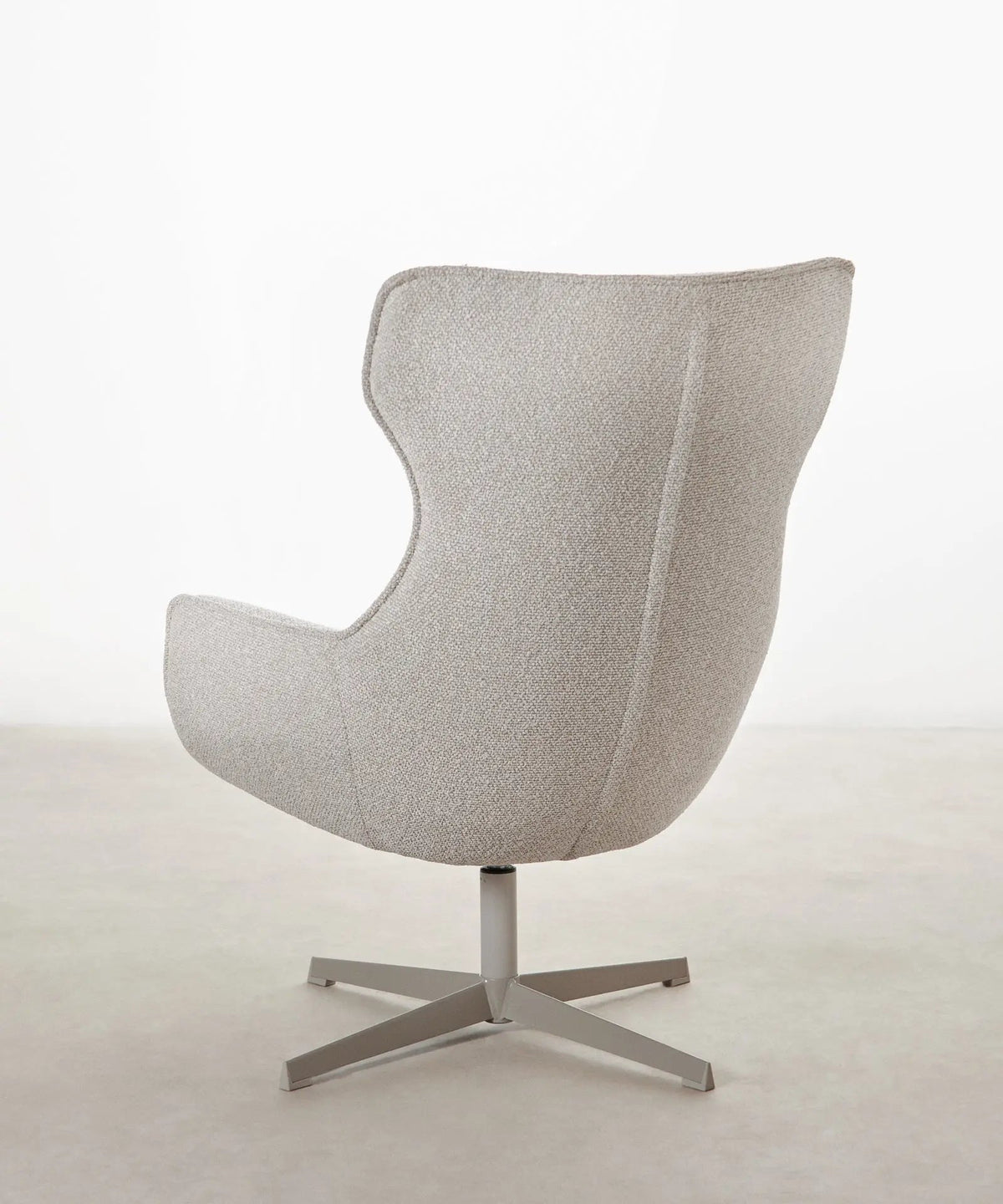 Fauteuil rotatif de tissu bouclé Elsa
