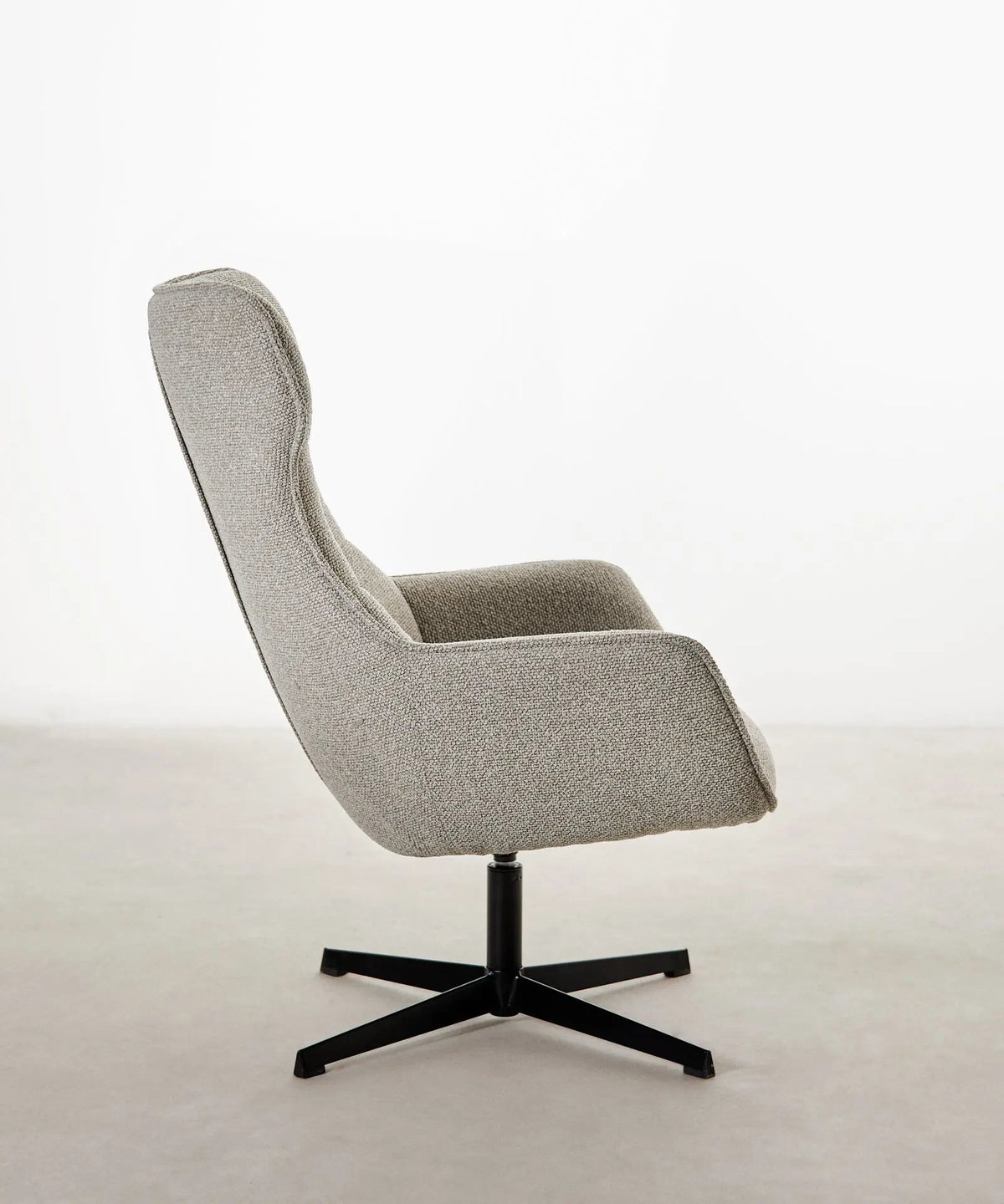 Fauteuil rotatif de tissu bouclé Elsa