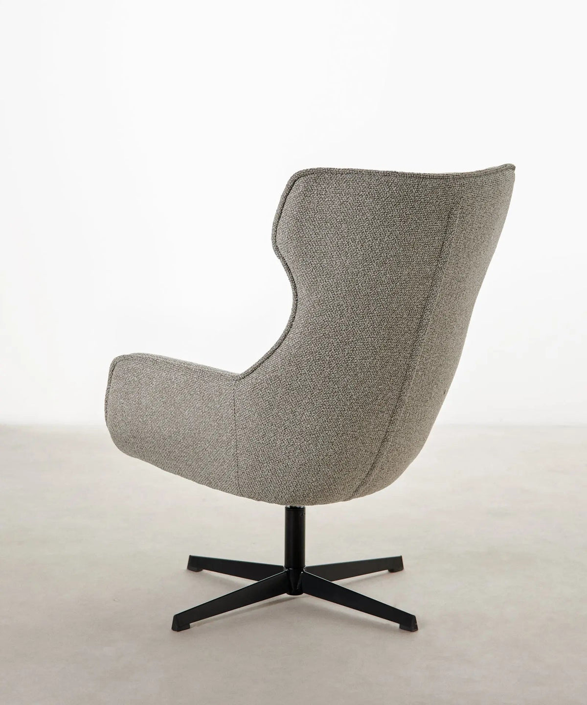 Fauteuil rotatif de tissu bouclé Elsa