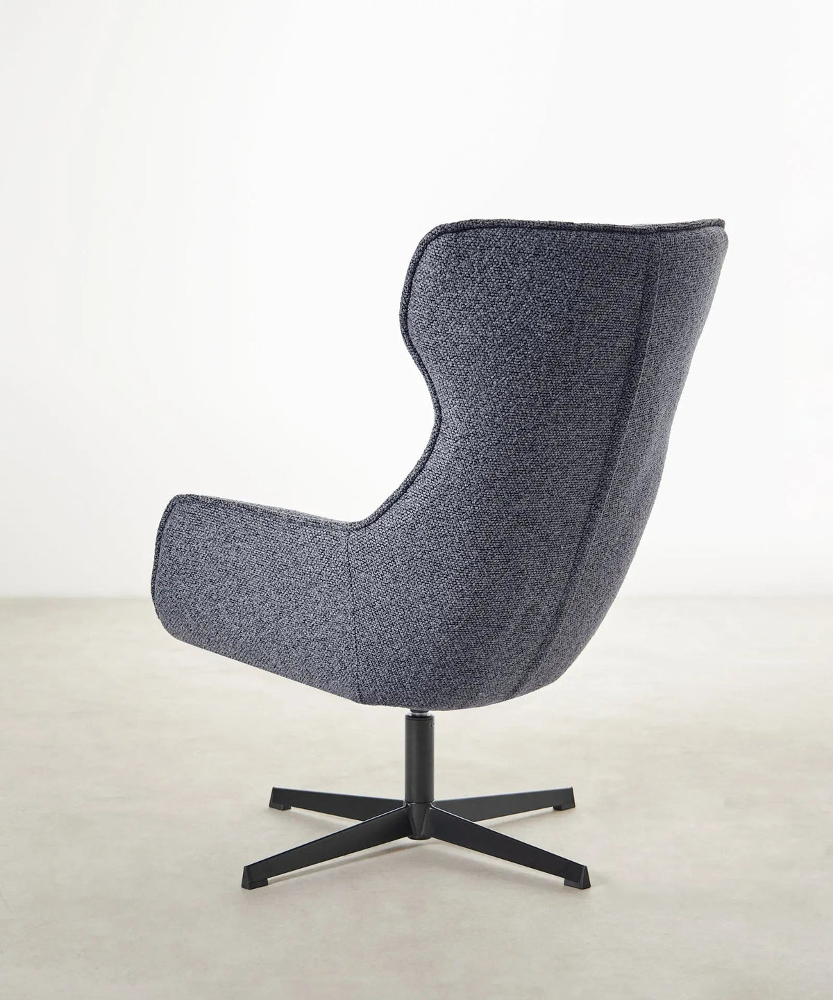 Fauteuil rotatif de tissu bouclé Elsa